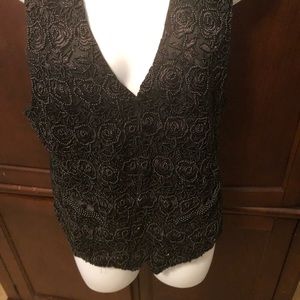 Black Rinestone vest.
